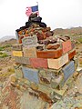 Brick and stone monument at Tule Well commemorating the dedication of CPNWR, 2014