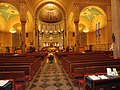 The church interior. Notice the sanctuary dome which is a copy of that of St. Clemente Bascilica Rome.