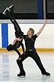 An ice dancing lift with the lifting partner in an Ina Bauer position (Isabelle Delobel & Olivier Schoenfelder)