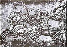 Bas-relief montrant des cavaliers au galop.