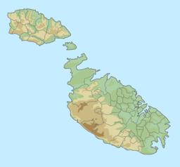 Map of the Maltese archipelago with a red dot on the northwestern coast of the island of Malta showing the location of Mistra Bay.