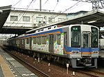 2044F「花のラッピング列車」 （2008年8月31日 河内長野駅）