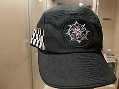 A dark green cap of the Police Service of Northern Ireland