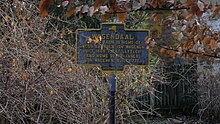 a picture of the marker from a distance because it is on private property