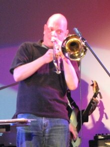 Slater performing with Thomas Dolby in 2011