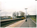 A picture of Banbury station. The picture is date stamped. The picture is date stamped. A EWS freight rain and a Wrexham, Marylebone train are here to.