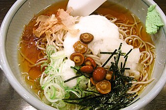 Wasabi in a bowl of noodles, with nameko mushrooms