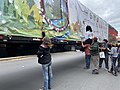 People signing the truck transporting the 2021 Capitol Christmas Tree at an event in Ukiah, California