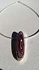 Handmade fordite pendant, 2013