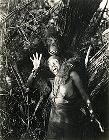 Charles Gemora in the Gorilla suit with another actor in Ingagi.