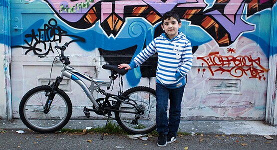 a boy and his bicycle