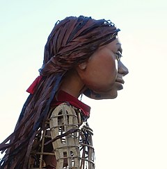 Side view of head of little-girl puppet