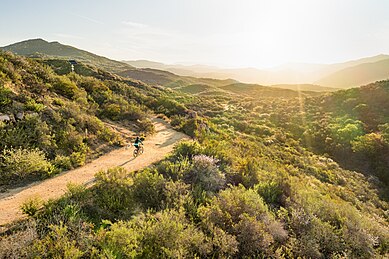 An aerial view of a mountain biker in Daley Ranch in Escondido, California.