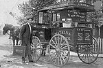 J. R. Watkins with horse and buggy sales wagon