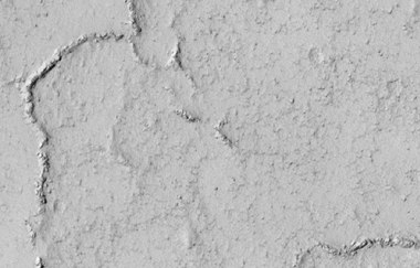 Close view of ridges on crater floor, as seen by HiRISE under HiWish program. Ridges are seen to be breaking up into boulders.