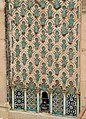 Zellij on the minaret of the Bou Inania Madrasa in Fez (14th century), with mosaic panels below and green sgraffito tiles above