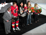 Olli Jokinen is presented with a silver stick for his 1000th game played