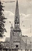 Le Pardon de Rumengol L'Eglise et le Clocher - Picture postcard showing the flags around the spire, used to give a festive look leading up to the pardon.[8]