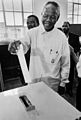 Image 100Nelson Mandela voting in 1994, after thirty years of imprisonment. (from 1990s)