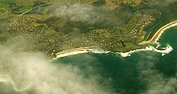 Jones Beach visible in the centre of the picture, with Kiama Downs (left) and Minnamurra (right).