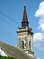 The steeple of the Catholic Church.