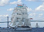 Three-masted ship with sails unfurled