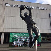 A statue of Van Leeuwen in front of Euroborg