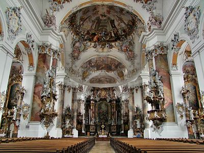 A highly theatrical white Rococo interior from the 18th century, at the Basilica at Ottobeuren, in Bavaria.