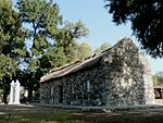 The heavy ironstone foundations were laid on limestone. The walls are partially built of dolerite. O The church was opened on the first Sunday of January 1831. It had taken 4 years to build the church. Bartlett died in 1849 and Cornelis Kok kept up the services by using Griqua lay readers. In 1889 the??? This site was one of the earliest centres of Chr Type of site: Church Previous use: Religious : Church. Current use: Religious : Church. The main road from Kimberley to the west crosses the Vaal at Schmidtsdrift. Forty kilo