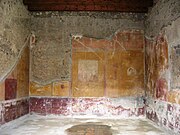 Photograph of Roman ruins, painted with big blocks of yellow colour.