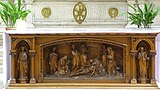 Sculpted wooden retable inside the Église Saint-Joseph