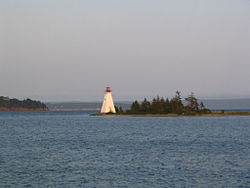 The Kidston Island Lighthouse which also appears on the village seal.