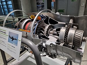 Pratt & Whitney Canada JT15D impeller with 7:1 pressure ratio would have required 6 or 7 axial stages in its place.[75] This centrifugal stage uses pipe diffusers rather than diffuser vanes. The fan blades are not installed in the fan hub which is in front of the small booster blades.