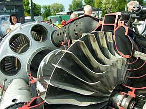 Klimov VK-1 This photograph shows typical centrifugal stage cambered diffuser vanes, but on the small cooling impeller for the internal air system. For the engine double-sided centrifugal compressor stage the equivalent have not been made visible with the sectioning.