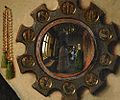 Detail of convex mirror in Jan van Eyck's Arnolfini Portrait, 1434