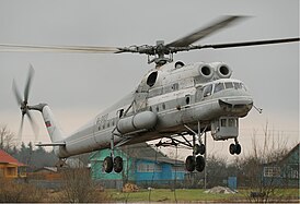 Ми-10К, принадлежащий НПО «Взлёт», приземляется после установки антенны