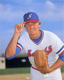 A baseball player in red, white, and blue