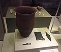 Beaker, wrist-guard with gold studs, copper dagger and toggle.[198]