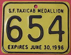 Plaque de licence de taxi américain dans les années 1990.