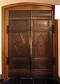 bronze-clad central doors