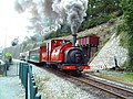 Train hauled by Ffestiniog Railway locomotive Prince departs Caernarfon station, October 2002.