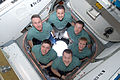STS 130 crew members pose for a portrait in the Cupola