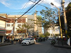 E. Pascua Street with Carmona Sports Complex and Circuit Makati on the background