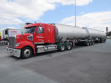 A B double tank truck parked near the Hume Highway in Australia