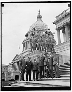 May 21, 1937 - Left to right: Colin H. Livingstone, Sen. A.J. Ellender, Harvey Gordon, William G. McAdoo, James E. West, and Dan Roper