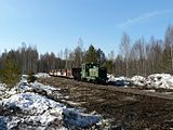 Locomotive TU4-818 with freight train