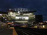 The Howard Beach–JFK Airport station tracks and platforms at night in 2006