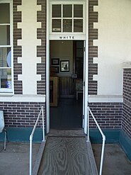 Door to the "white" bathroom at a railroad station (Florida)