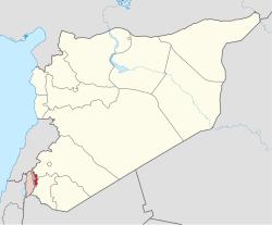 Map of Syria with Quneitra Governorate highlighted Syrian held areas are red, a large portion of the governorate is in the UNDOF buffer zone (hatched pink) and Israeli-occupied Golan Heights (hatched).