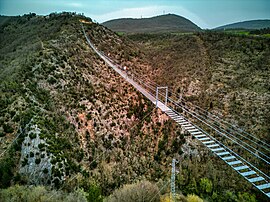 Since 2024, the village has been connected to the Montesanto Castle by the new 175-meter-high Tibetan bridge, making it the highest in Europe.